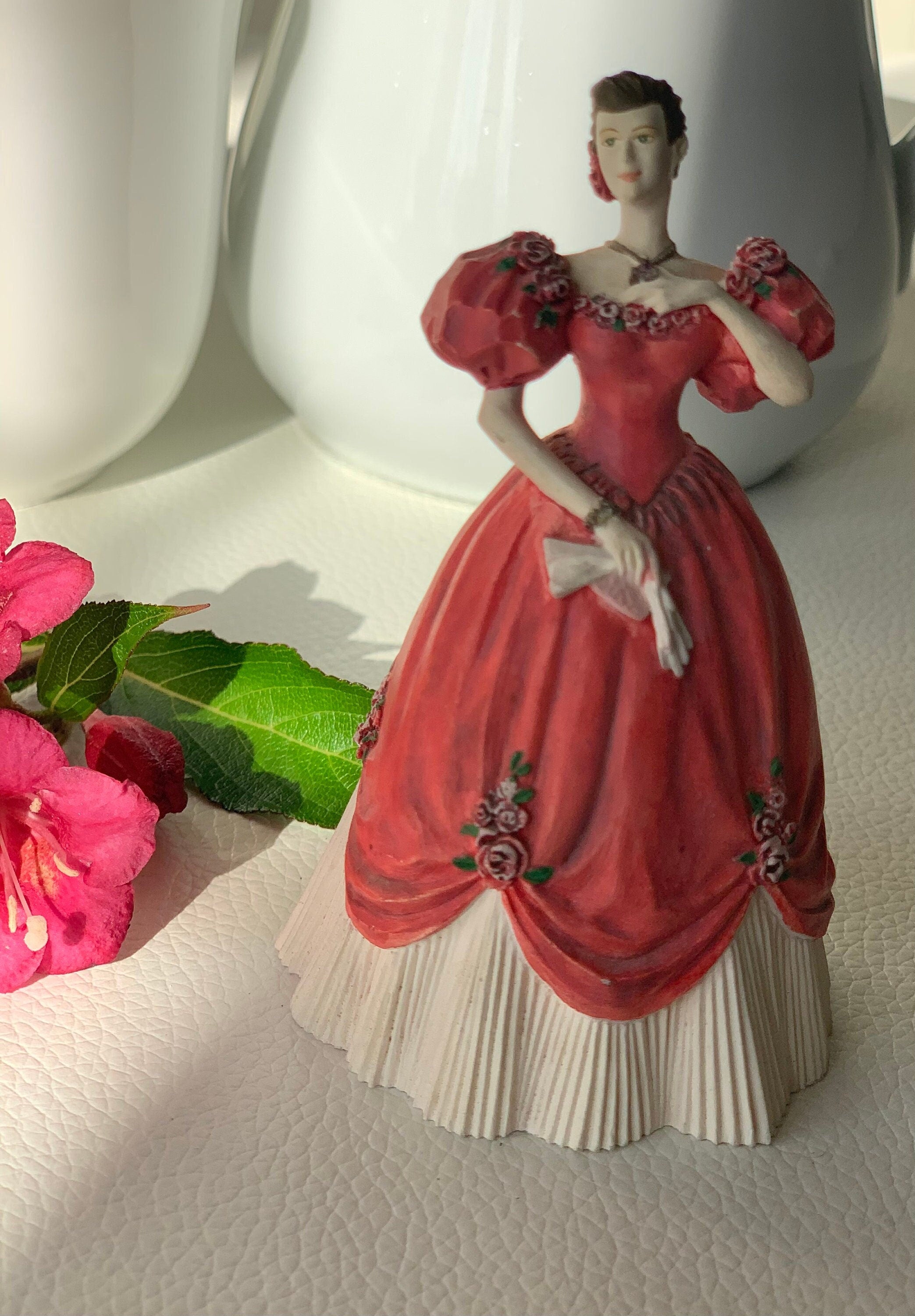 Tiny vintage plaster figurine of a woman in ball red dress signed July Ruby crafted in Malaysia. Vintage collectible Malaysian souvenir