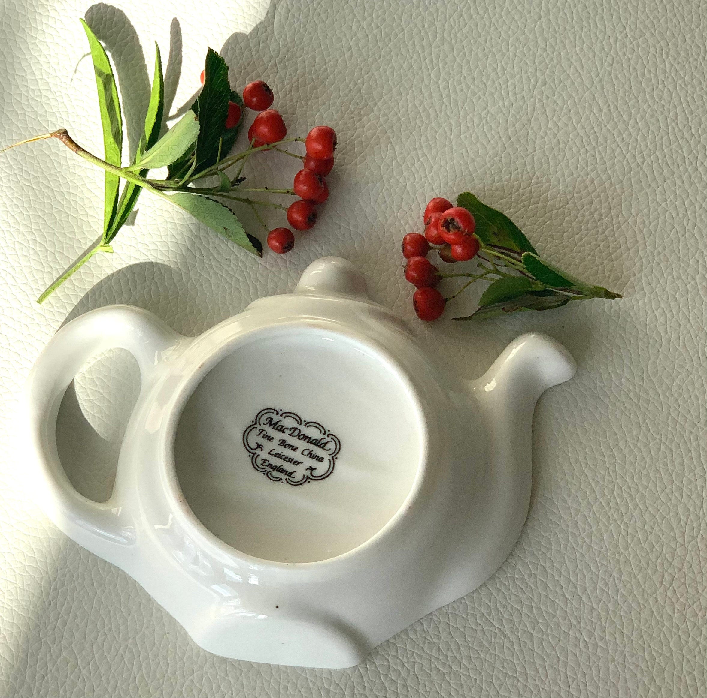 Vintage white porcelain floral tea bag or spoon rest in a shape of a tea pot. Nostalgic collectible souvenir from England. Gift unisex