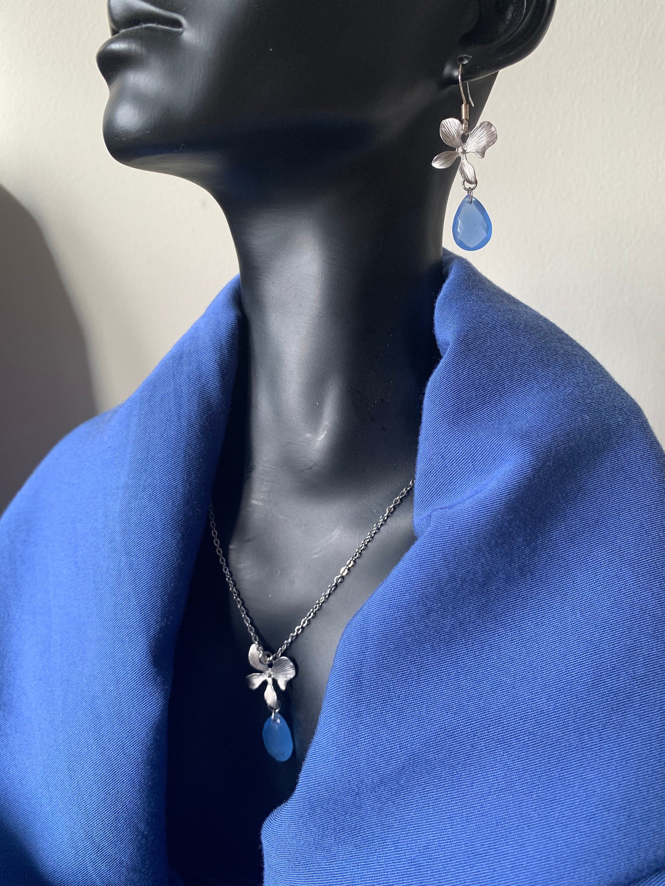 Natural Indian Blue Chalcedony and Silver plated Orchid connector on Stainless Steel Fine Chain Necklace with matching Earrings Set. For Her