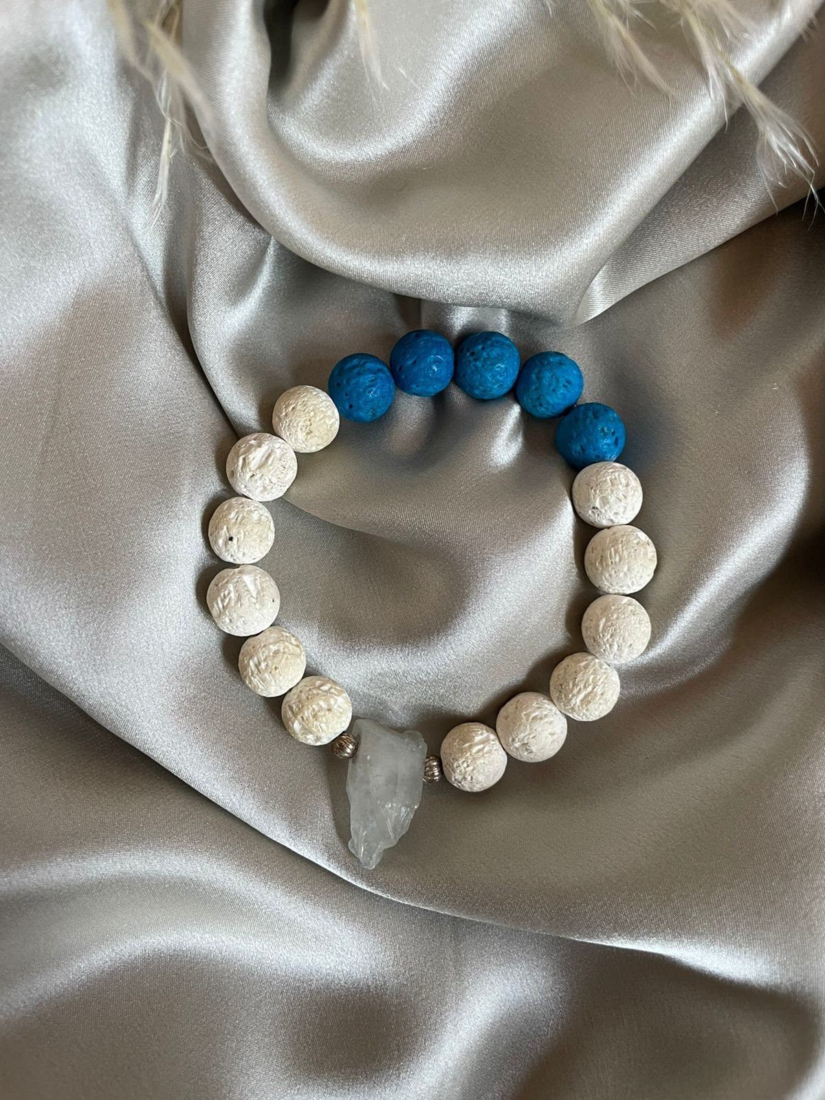 Natural white and blue (coloured) Lave stone beads with Clear Quartz central raw crystal magic bracelet. Meaningful gift for her or unisex