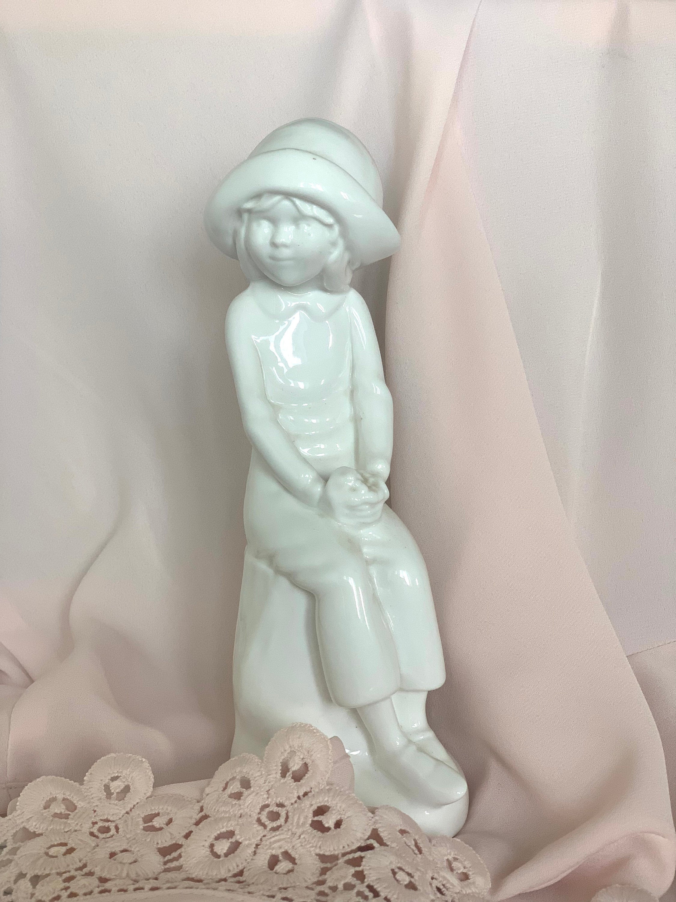 Lovely white porcelain figurine of a girl in boy’s clothes singed Joanne by Pauline Shore. Vintage collectible gift unisex.