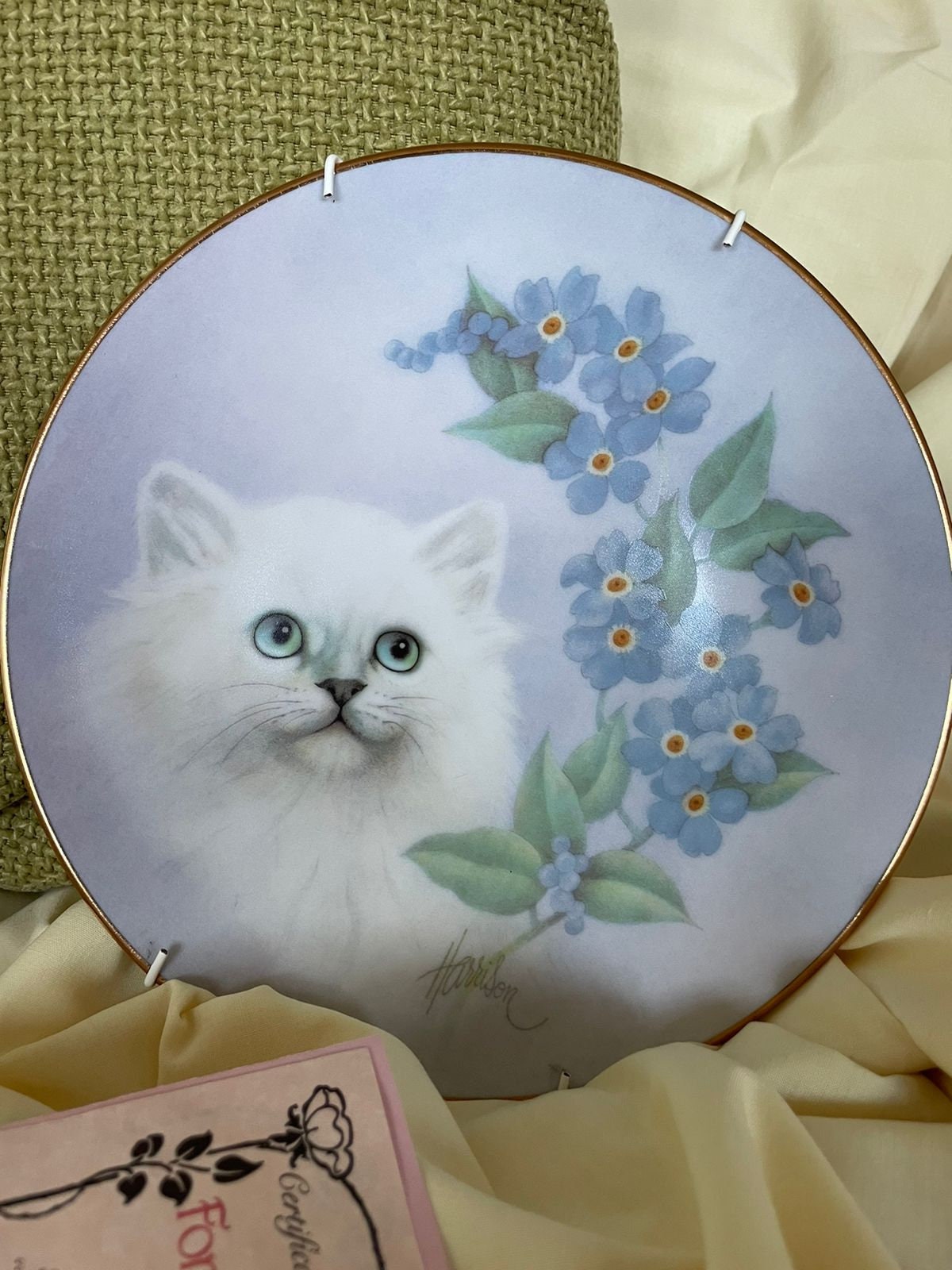 Limited edition of vintage Forget me not porcelain 24K gold edged plate signed by Bob Harrison with a cat and Forget me not flowers images.