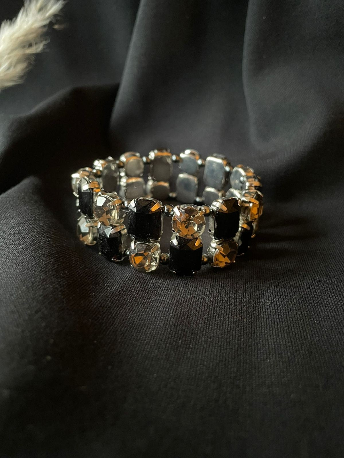 Sparkling silver tone metal with black and clear glass cabochons elasticated vintage bracelet. Bracelet for a woman. Gift for her