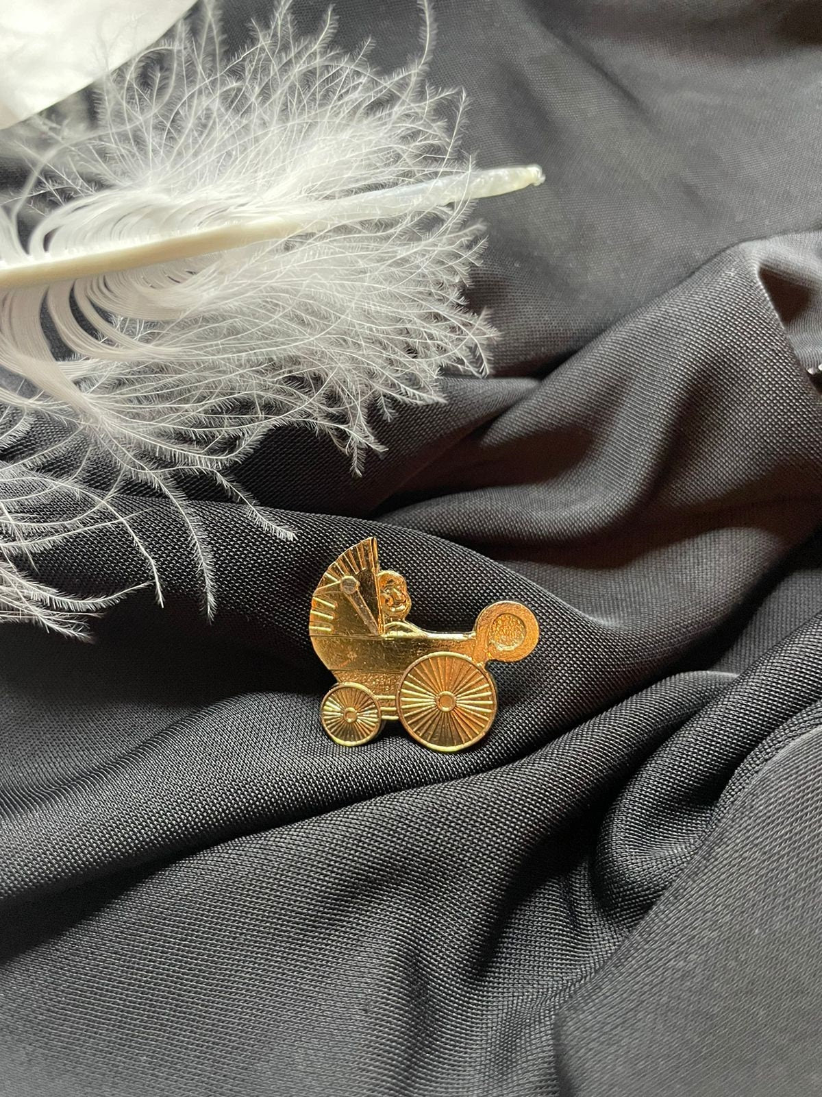 Pram with a child gold tone metal vintage lapel badge. Lovely vintage brooch for a young mother. Gift for her