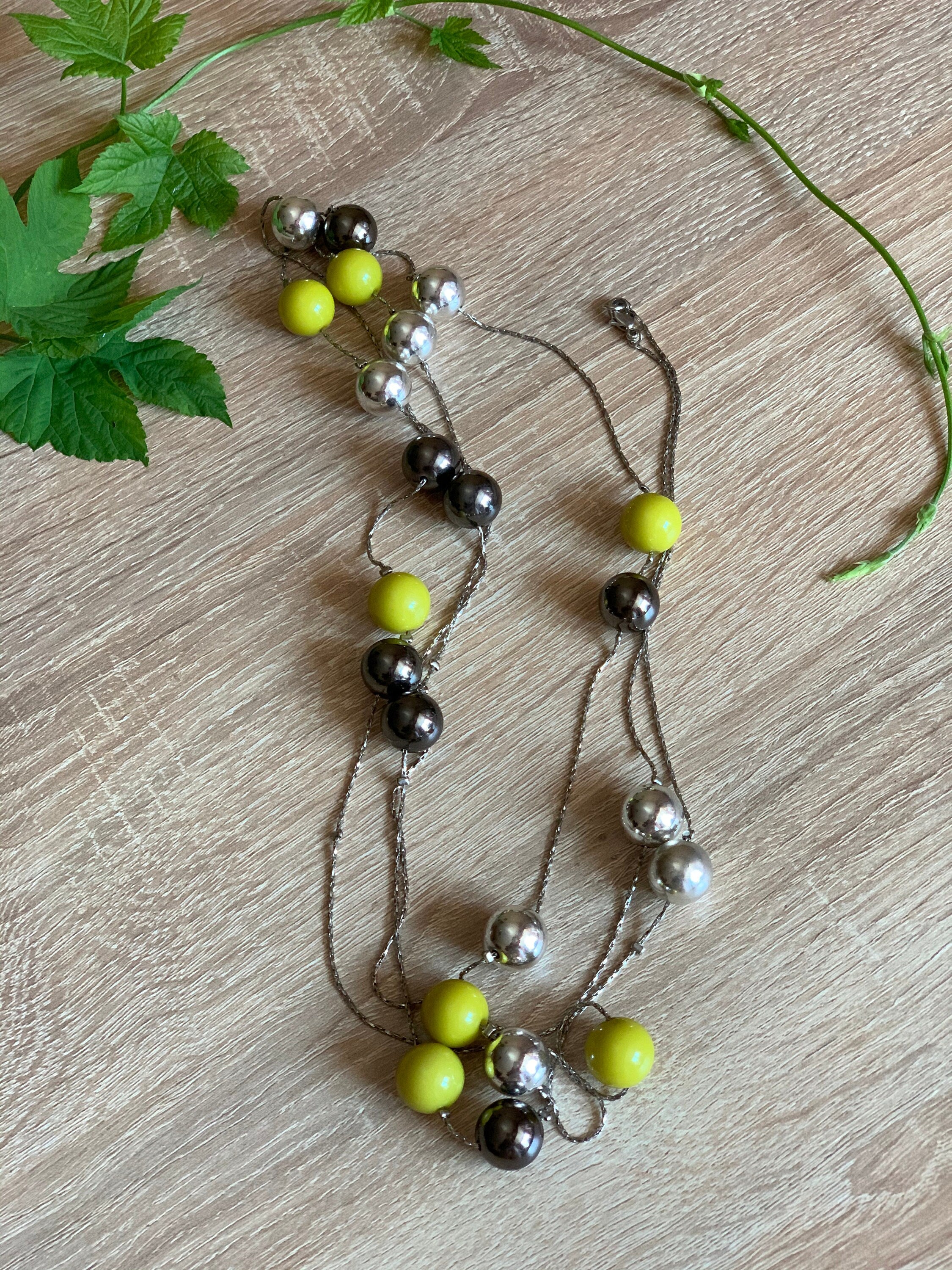 Stylish acid green and silver round beads on a very thin metal chain long continuous vintage necklace for a woman. Lovely gift for her