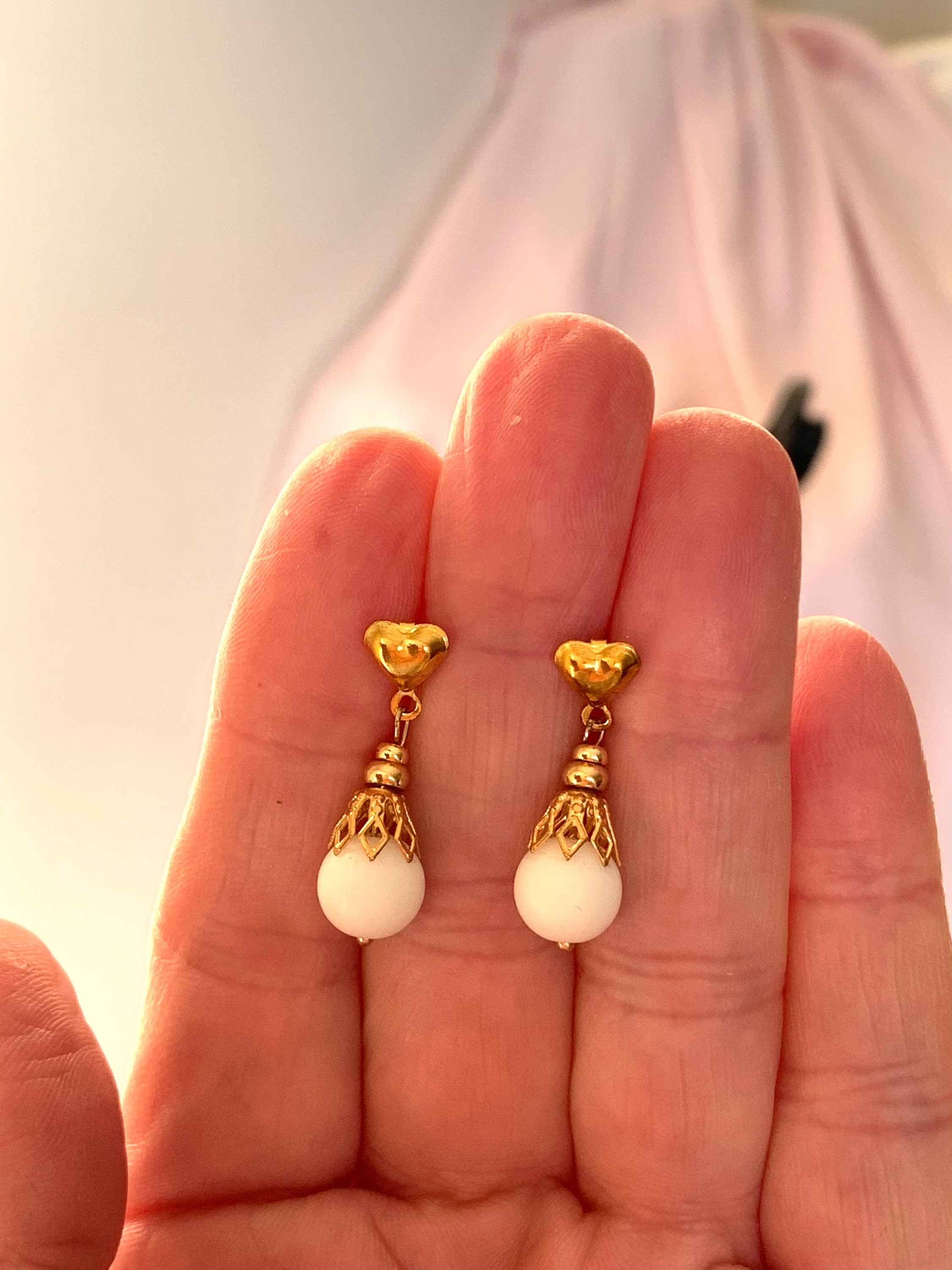 Natural white matt Jade beads in a gold tone settings handmade tiny dangle drop stud earrings for a woman. Gemstone white and gold earrings