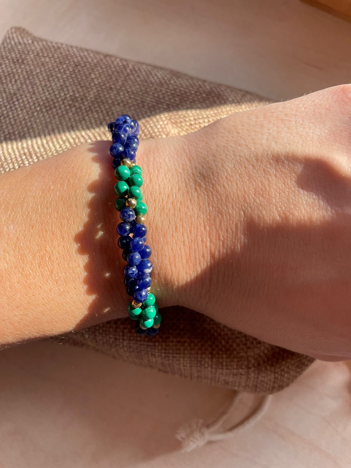 Natural Malachite and Lapis Lazuli 3 twisted strands beaded bracelet with gold tone clasp. Boho style vintage green and blue gems bracelet