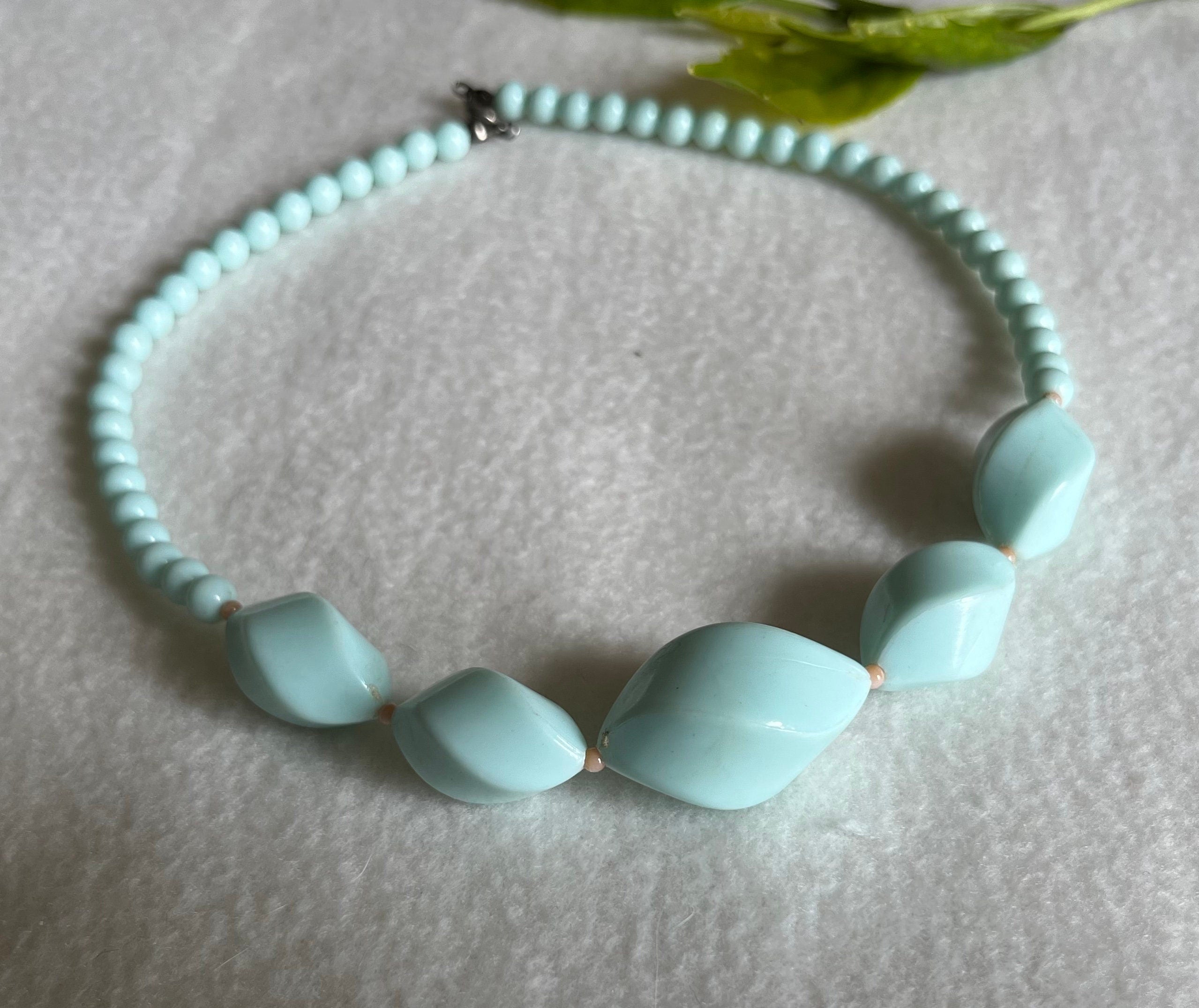 Pastel turquoise colour large twisted and smaller round plastic beads vintage 60s choker necklace. Vintage choker for a woman. Gift for her