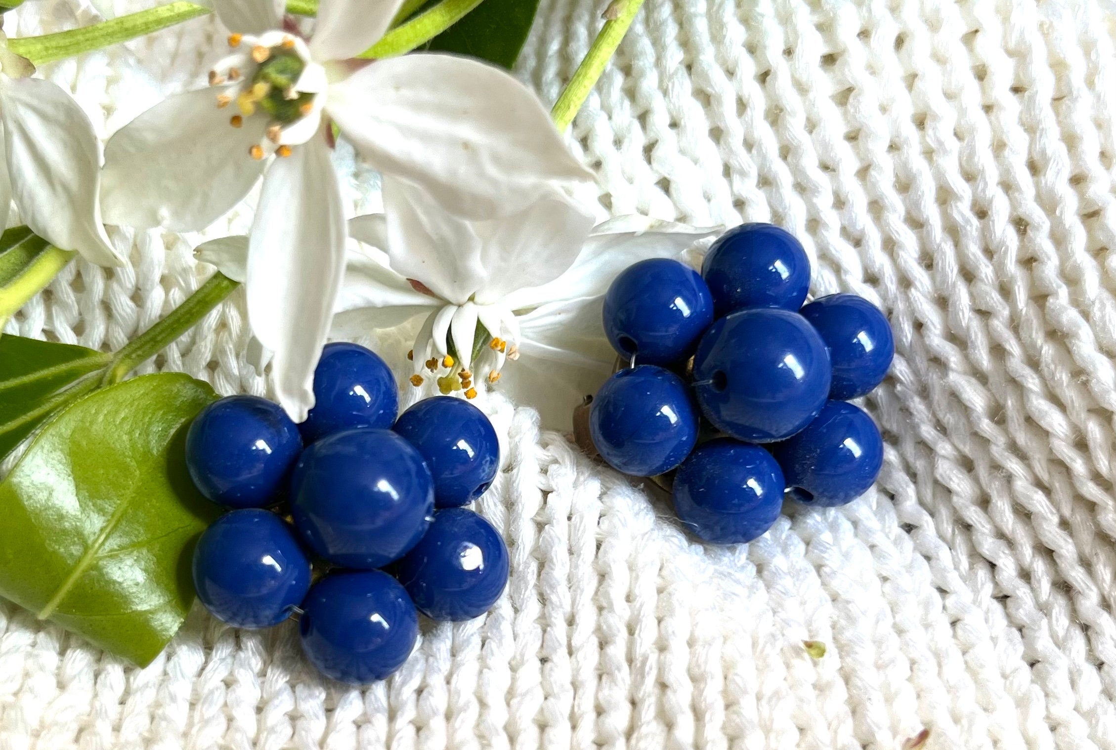 Ultramarine blue colour plastic beads in a cluster vintage clip on earrings. Vintage 60s plastic blue earrings for a woman. Gift for her.