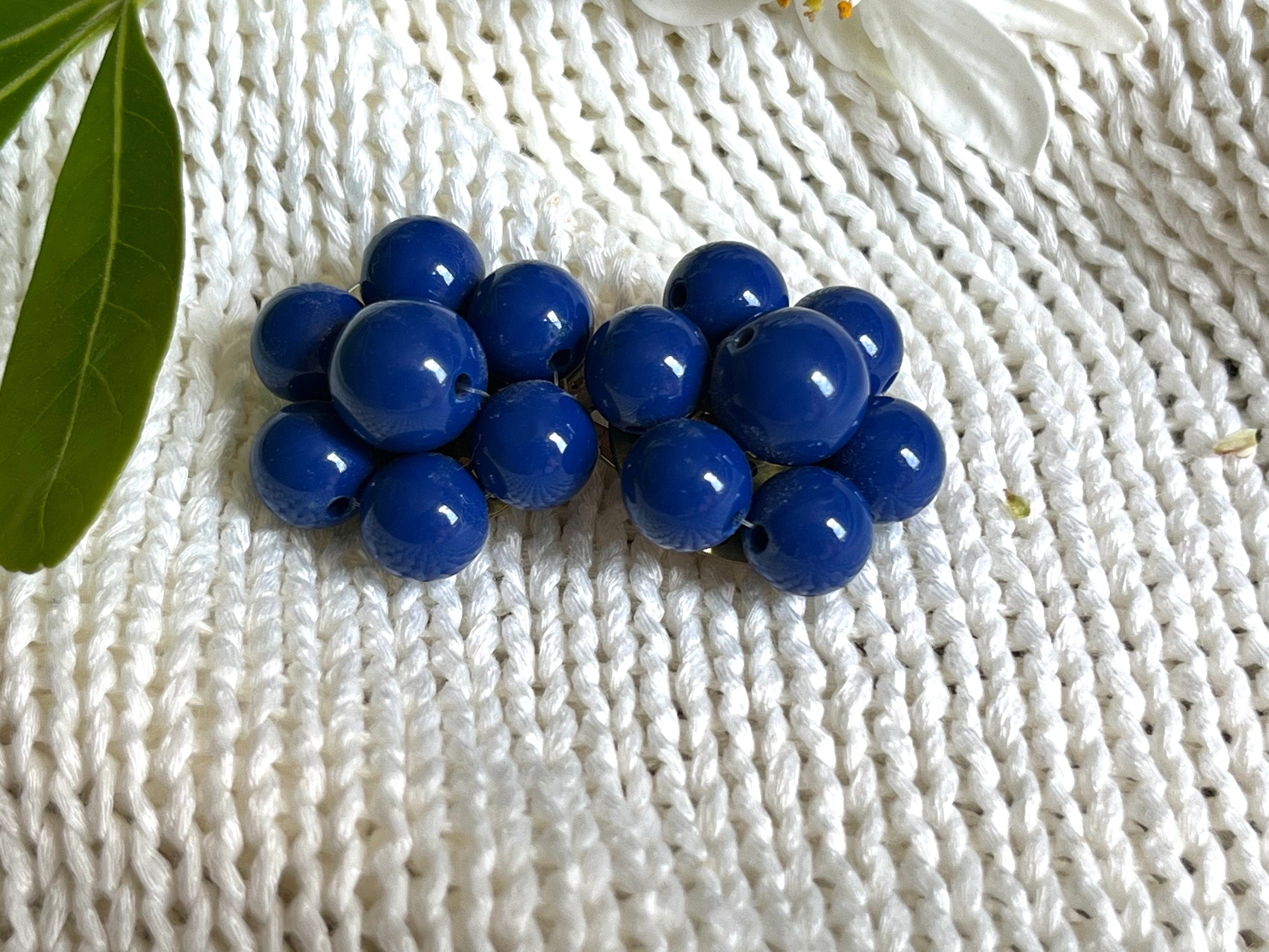 Ultramarine blue colour plastic beads in a cluster vintage clip on earrings. Vintage 60s plastic blue earrings for a woman. Gift for her.