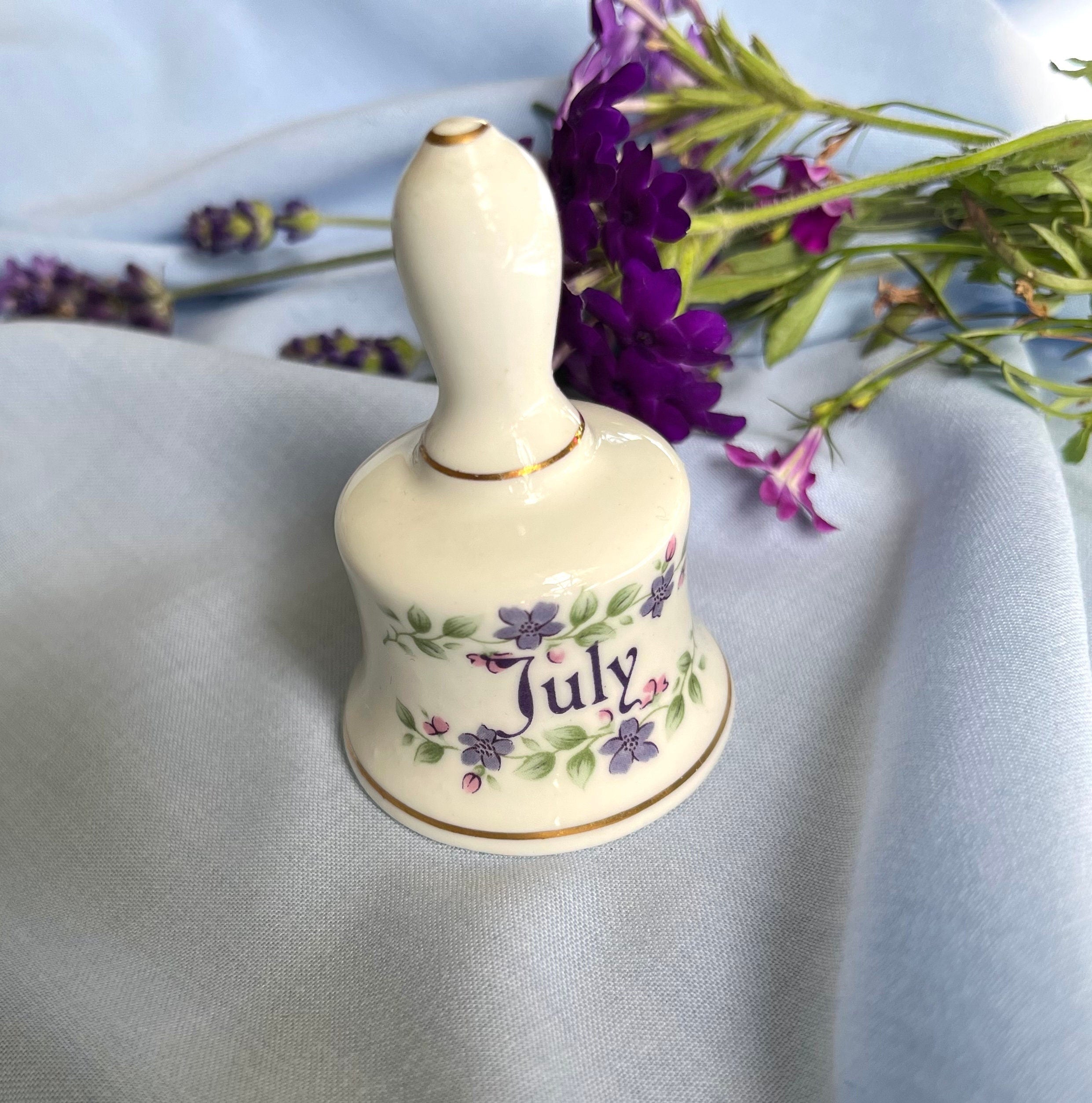 Signed July made in England bone china vintage bell with painted purple and pink flowers. Collectible souvenir from England. Gift unisex.