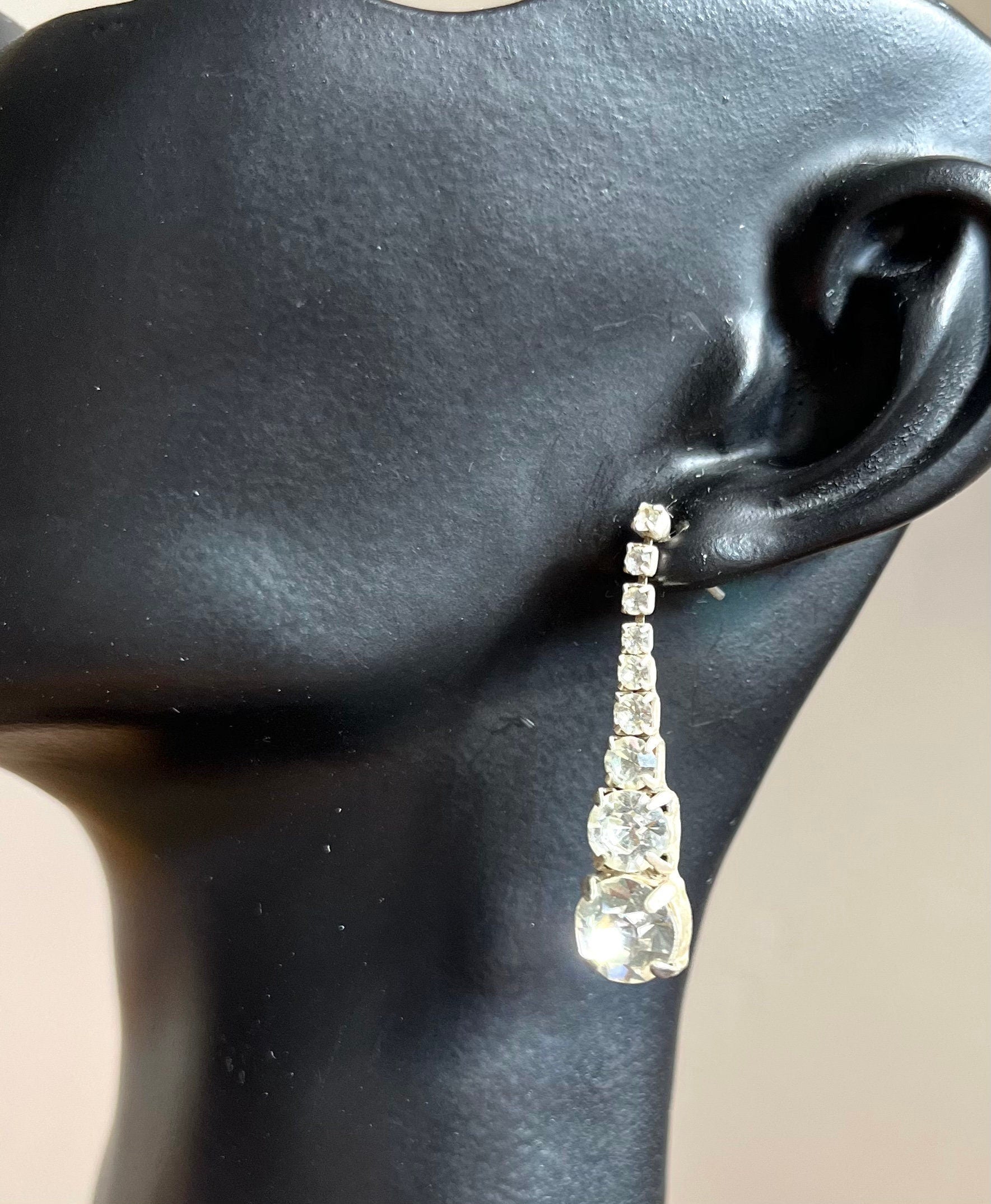 Silver tone metal and various size diamantes long tear drop stud vintage earrings for a woman. Beautiful wedding earrings. Gift for her.