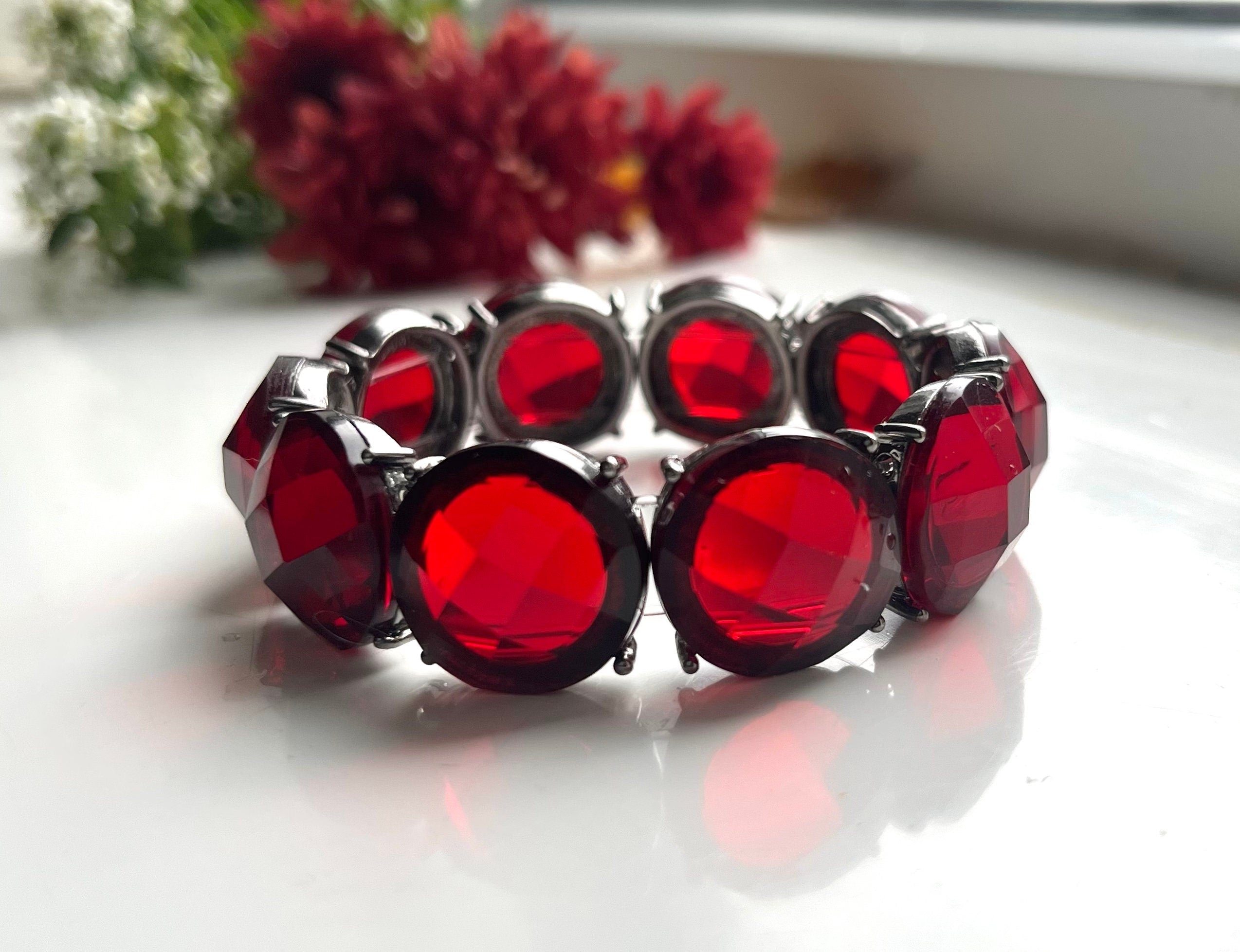 Stunning deep red colour facet cut framed glass beads double elasticated vintage bracelet. Lovely vintage gift for a woman. Gift for her.