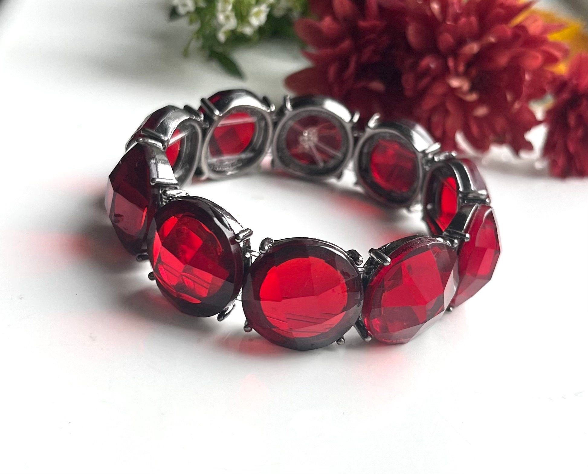 Stunning deep red colour facet cut framed glass beads double elasticated vintage bracelet. Lovely vintage gift for a woman. Gift for her.