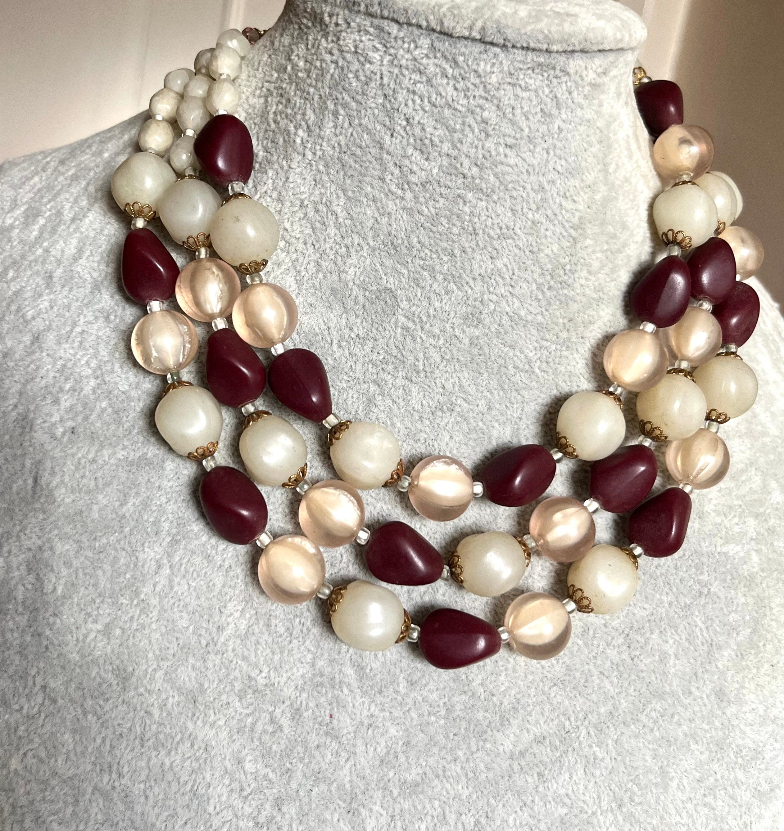 Vintage plastic 3 strand off white and burgundy colour beads necklace for a woman. Lovely vintage gift for her.