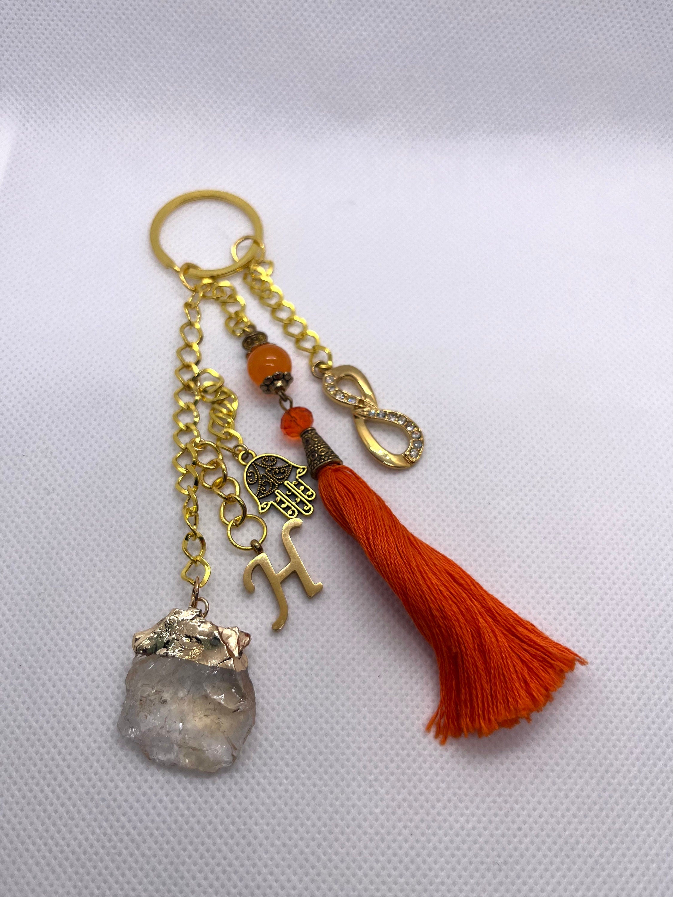 Personalised with Letter H Gold tone Metal Key Ring with Natural Citrine, Hamsa Hand, Orange Topaz and Cotton Tassel charms. Gift for Her.